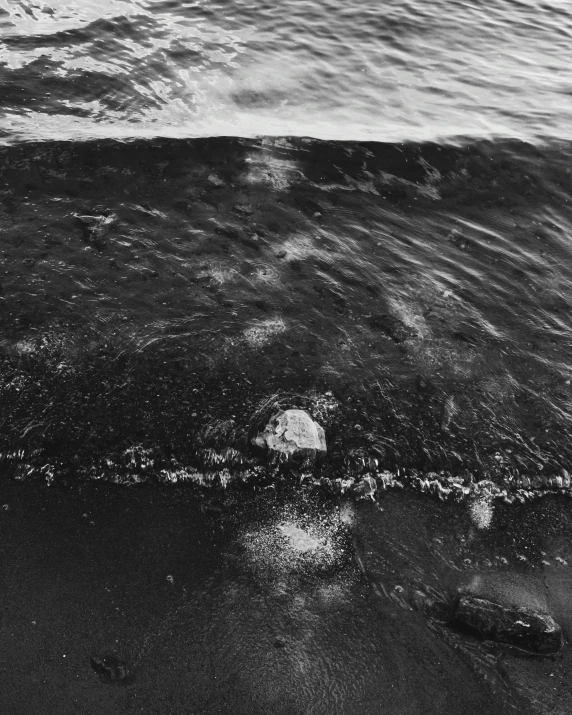 an image of the ocean and wave coming in