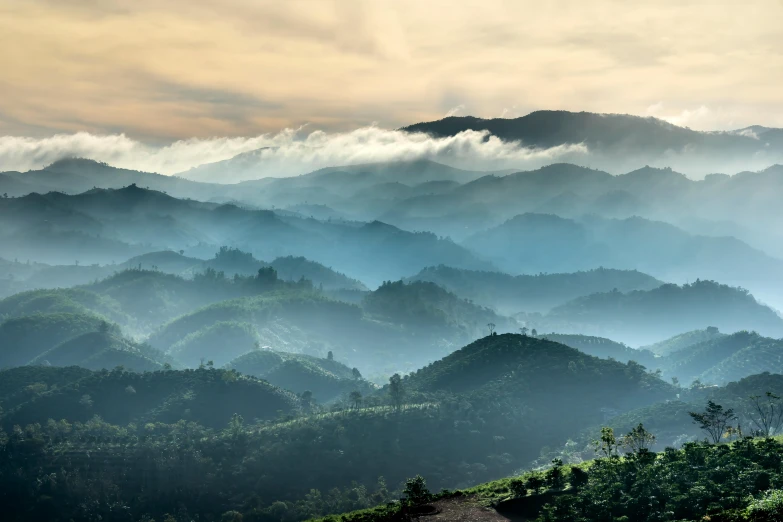 a view of an expansive valley from the mountains