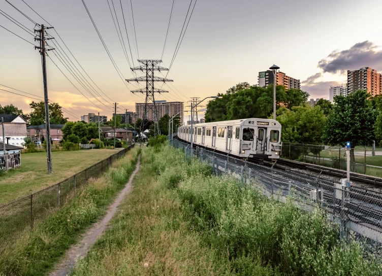 the train is traveling on the railroad tracks