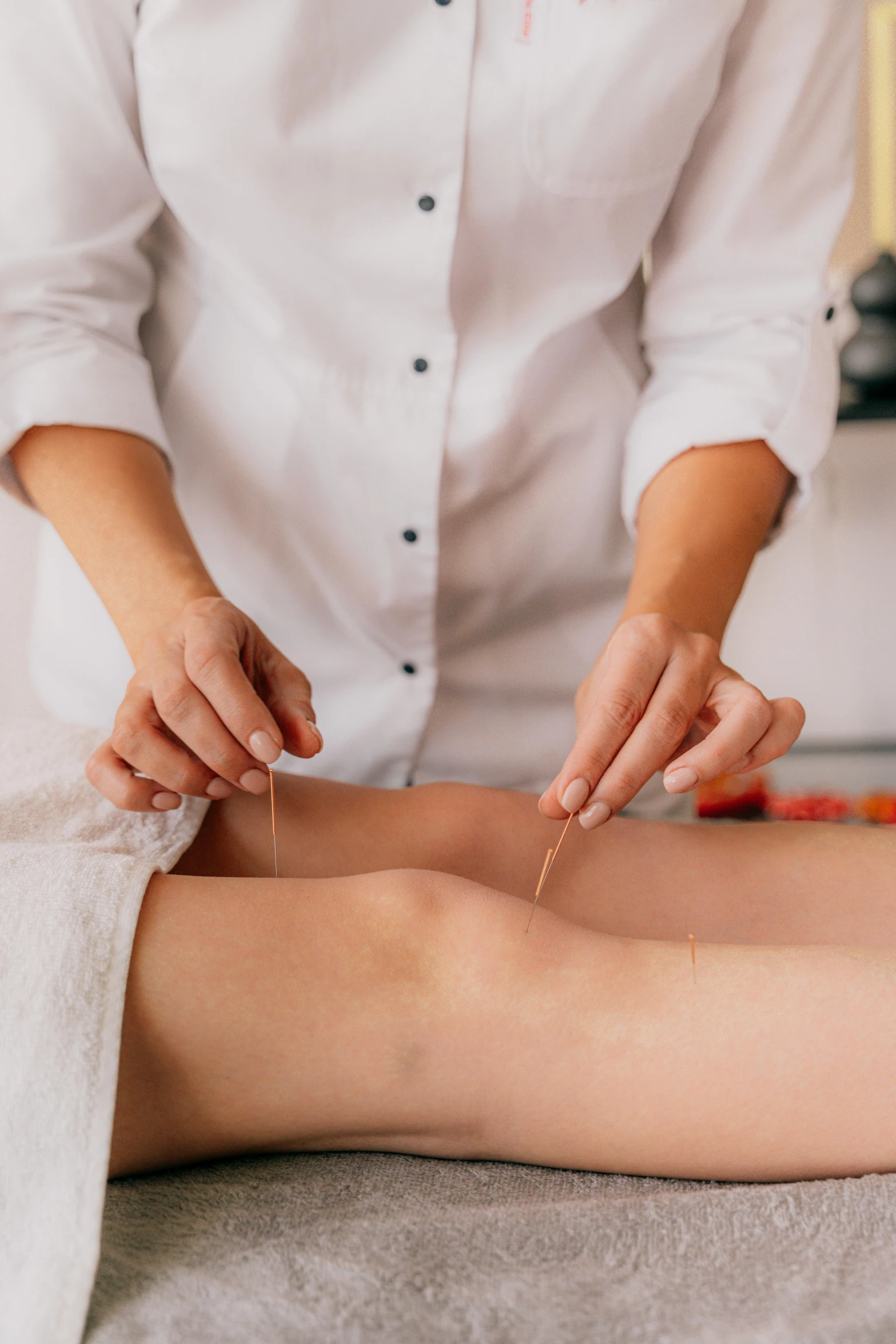 a person is getting a manicure at the same time