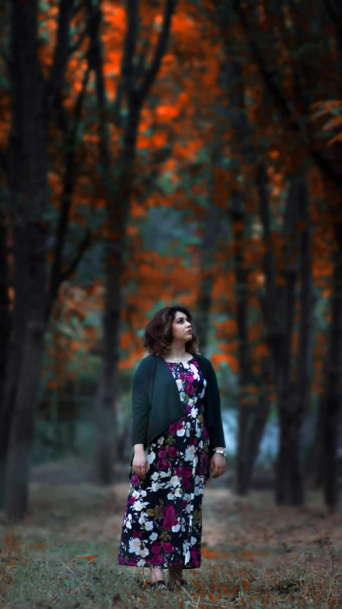 an image of a woman standing in the woods