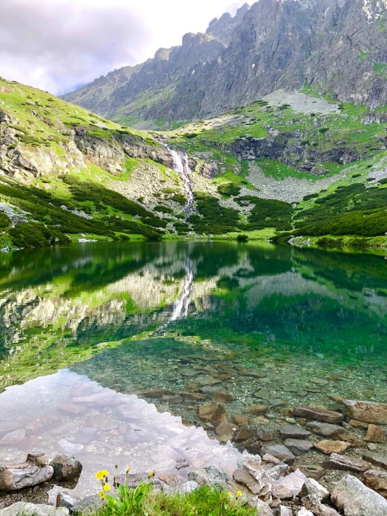 the water near the mountain was very clear