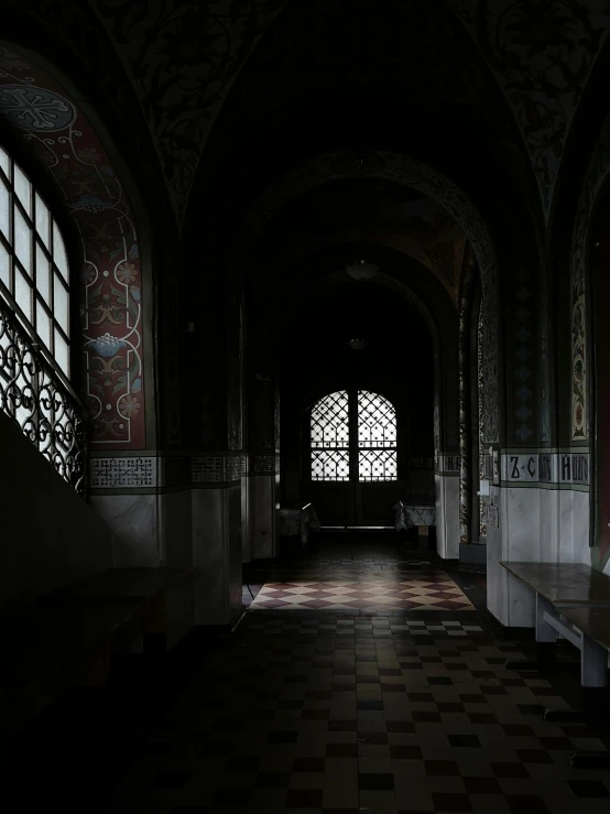 the light is shining through the windows in an ornate room