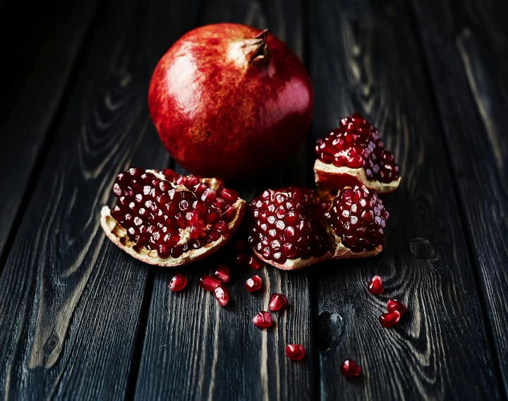 a couple pieces of fruit sitting on top of each other