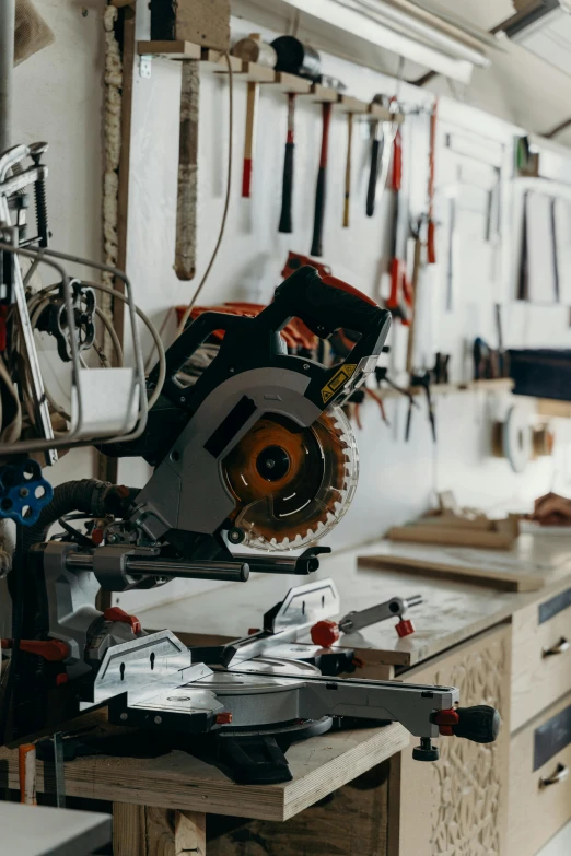 a table with a saw that is on top of it