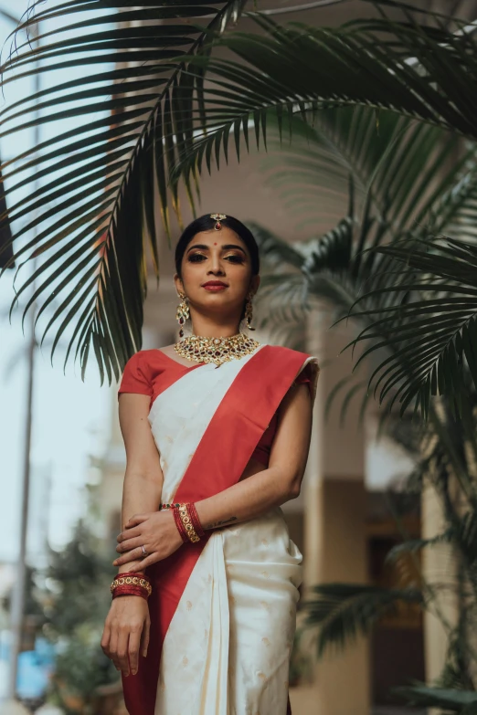 a woman in a white and red outfit