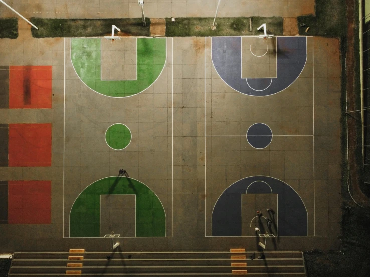 a basketball court with some green white and red lines