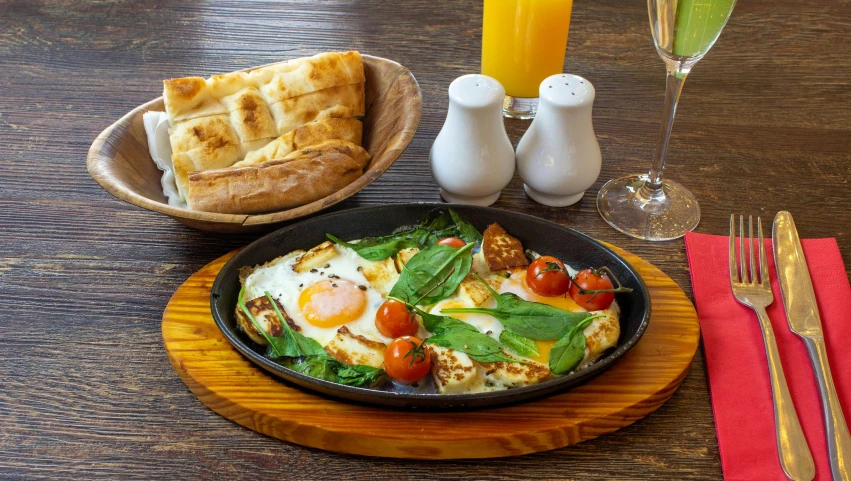 a plate of food with eggs and other vegetables on it