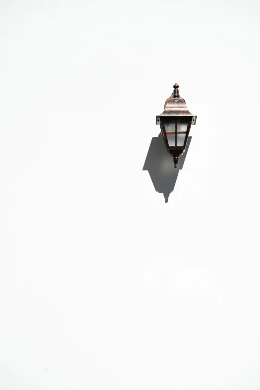 a lamp that is on top of a building
