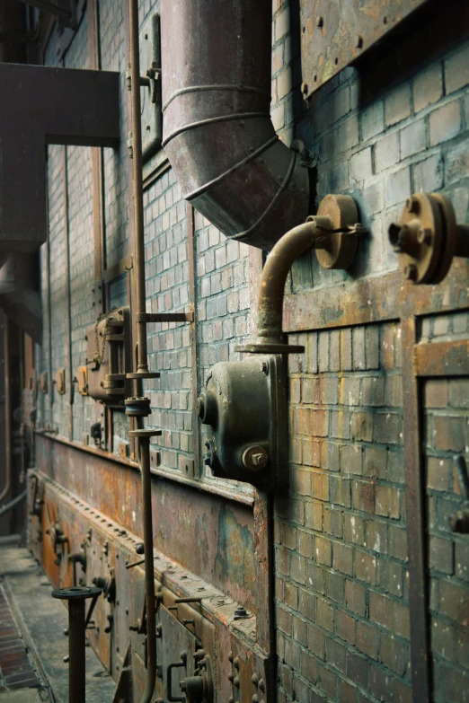 industrial pipes and equipment are in a large room