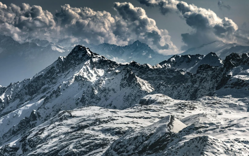 this po shows the majestic view of high peaks from the top