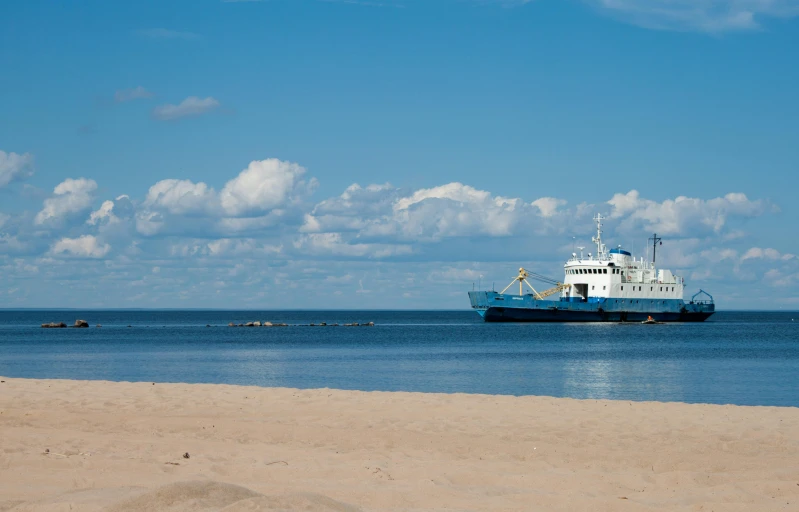 a large blue and white boat in the ocean