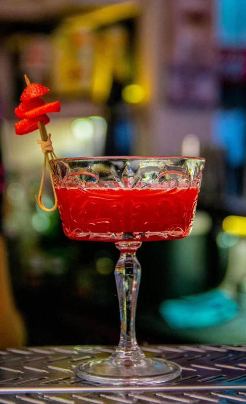 a glass that has been placed in front of a counter