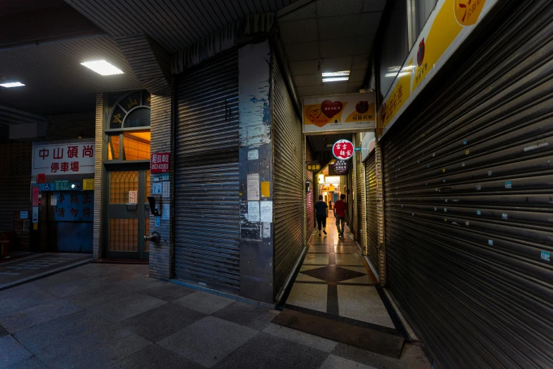 a long hallway leading up to a restaurant