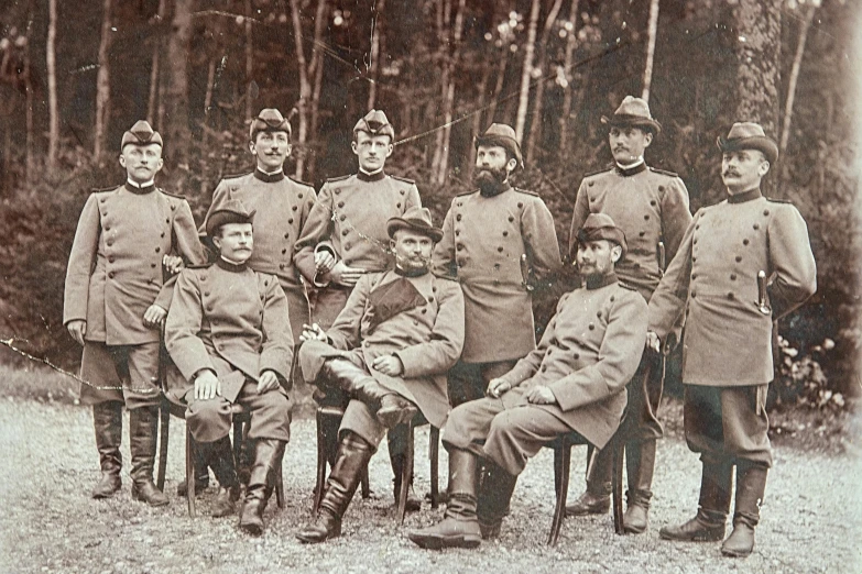 a black and white po of a group of men in uniforms