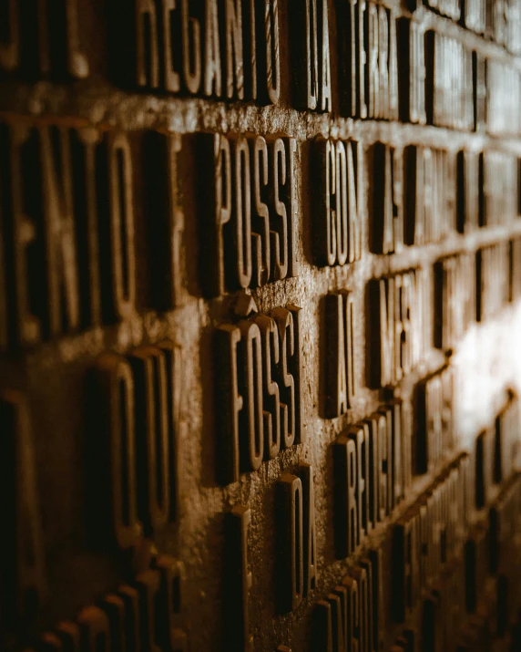 a number of stamps embedded in a wall