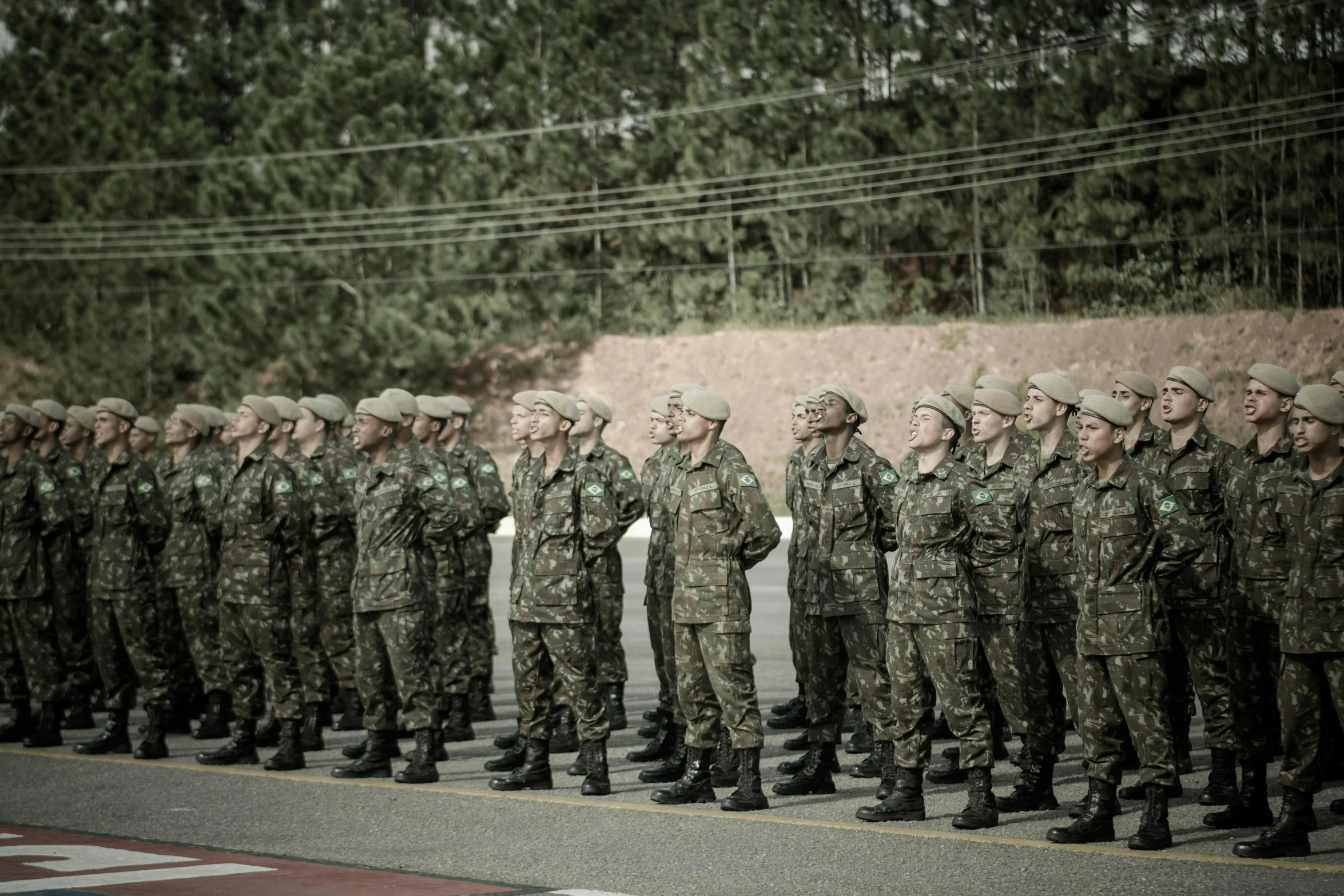 an army group standing at attention in uniform