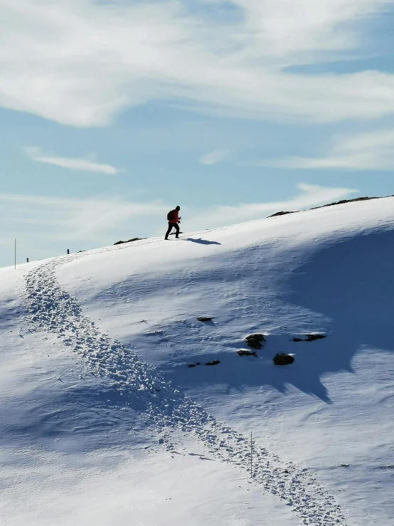 a man that is skiing down a hill