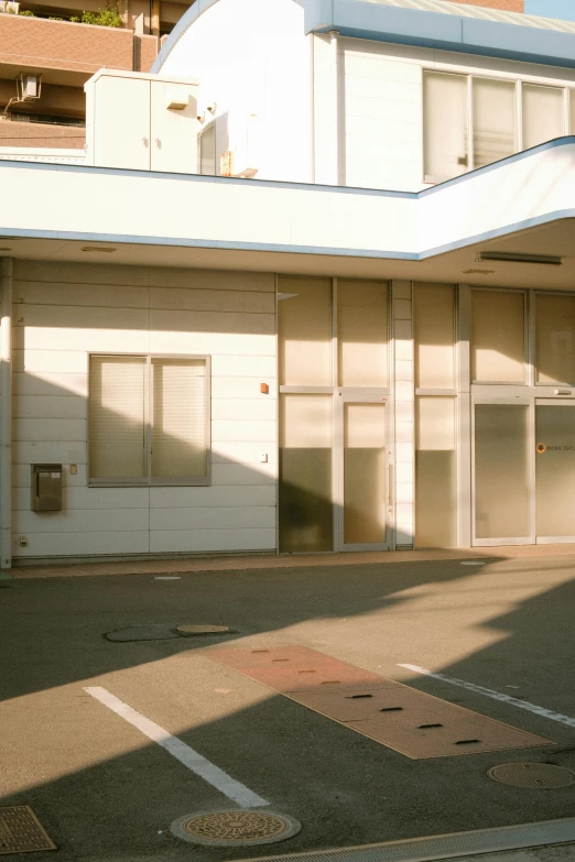 a large garage with lots of windows and no door in front of it