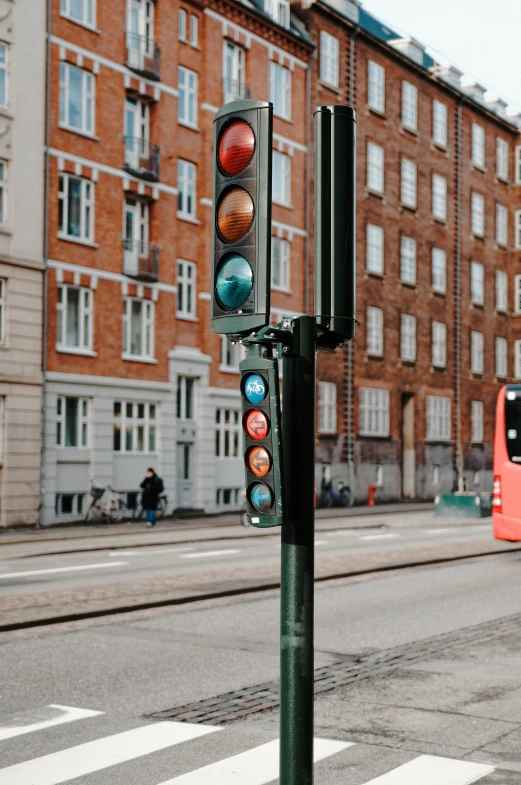 street sign with multi colored lights, at street corner