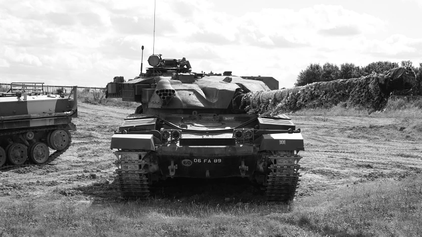 an armored tank parked in the dirt