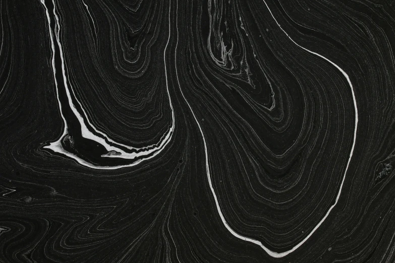 a painting of water and lines on black paper