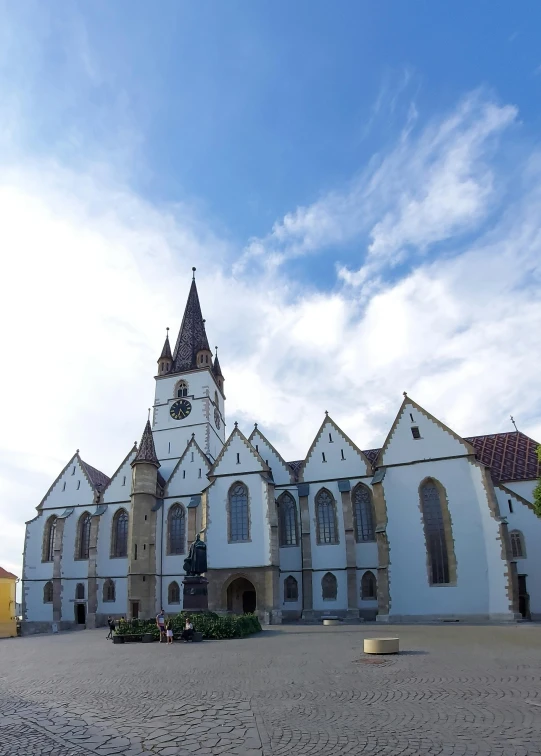 an old church with a clock tower on the front