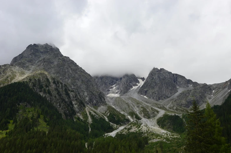 a view of mountain peaks from a valley