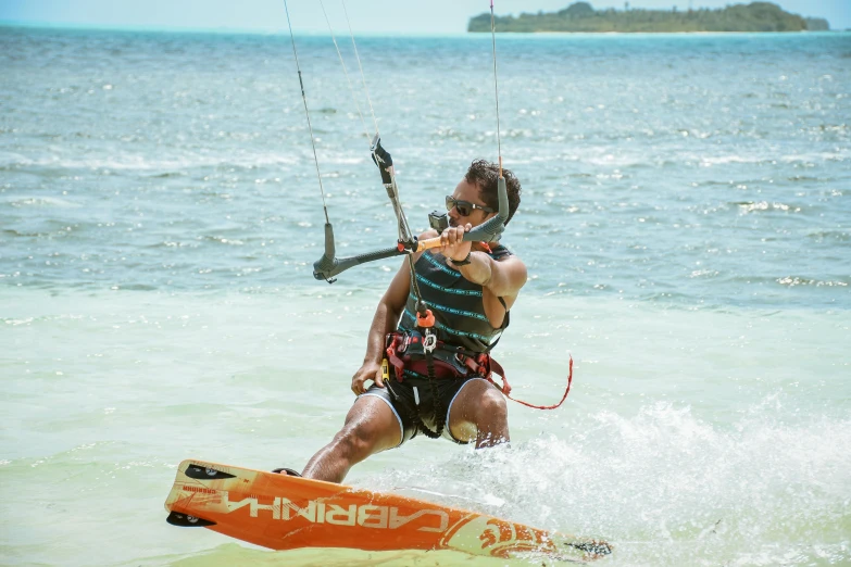 an image of a person parasailing in the water