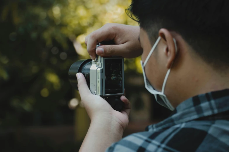 a man taking a picture with his camera