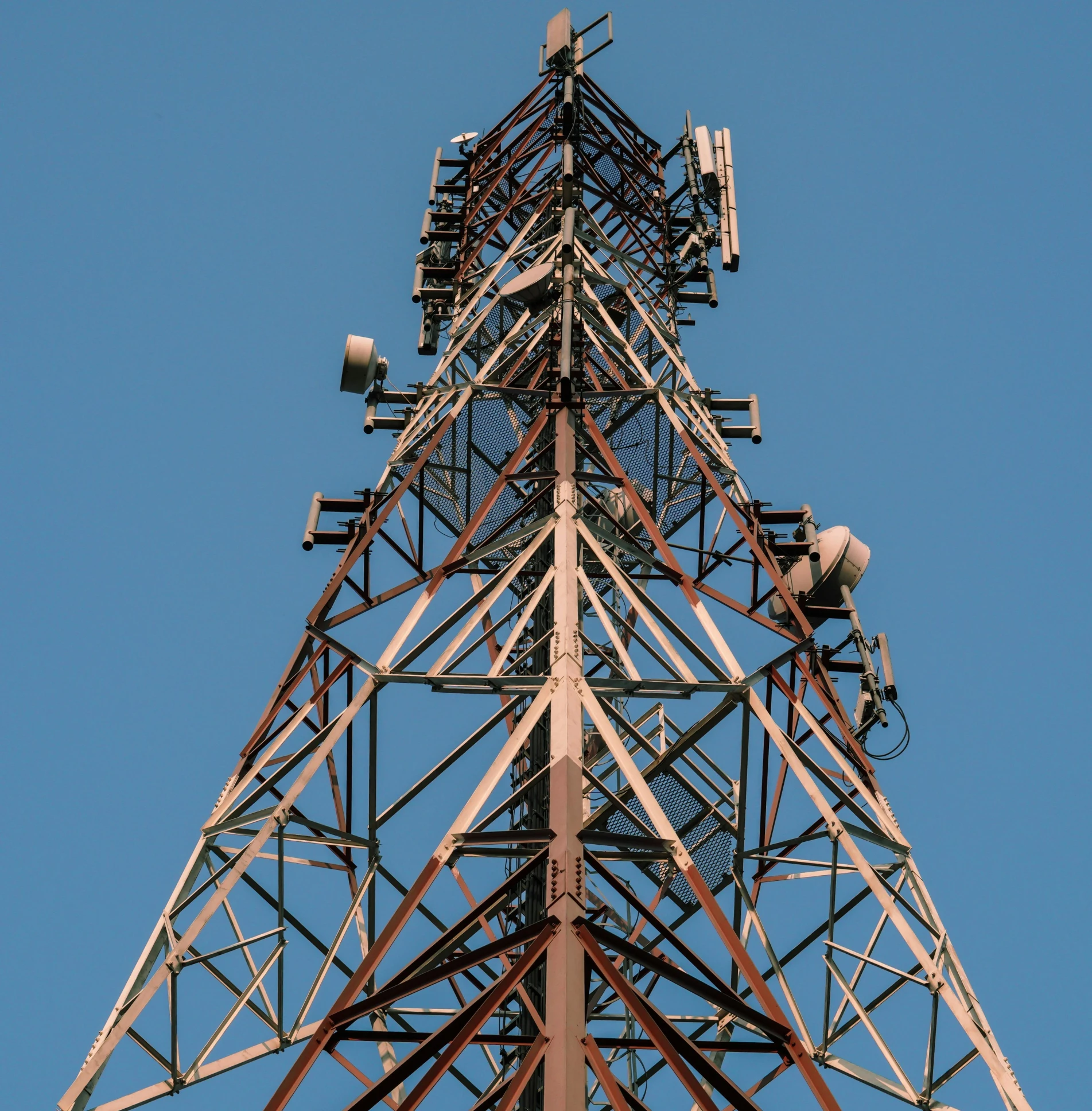 tower of many different heights and colors in the sky