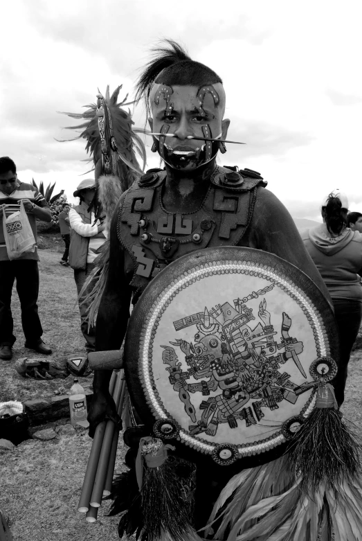 a black and white po of people dressed in costumes