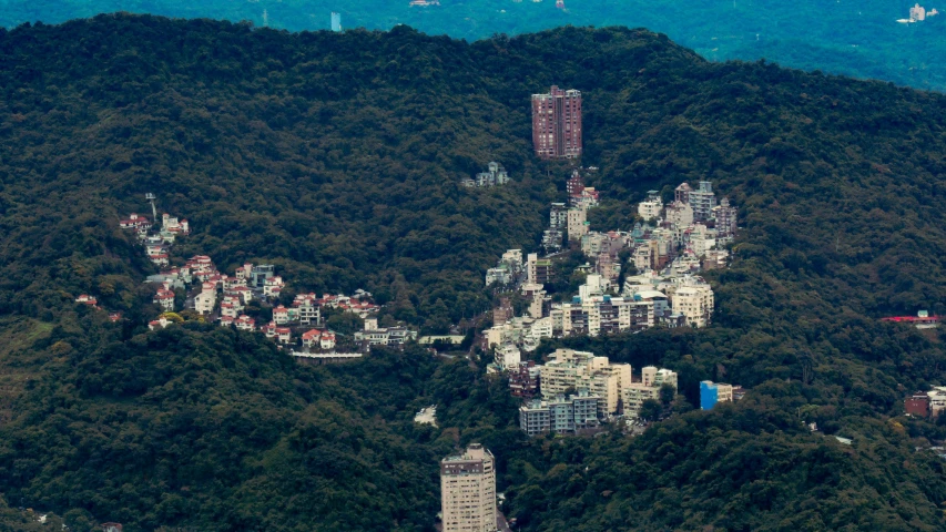 the city stands near a mountain and is very high in the sky