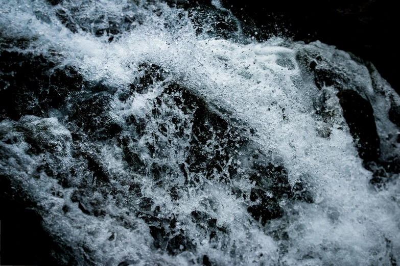 water is splashing off the side of a boat