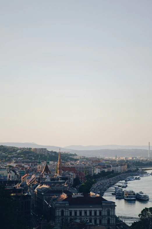 a view of a large body of water with buildings in the background