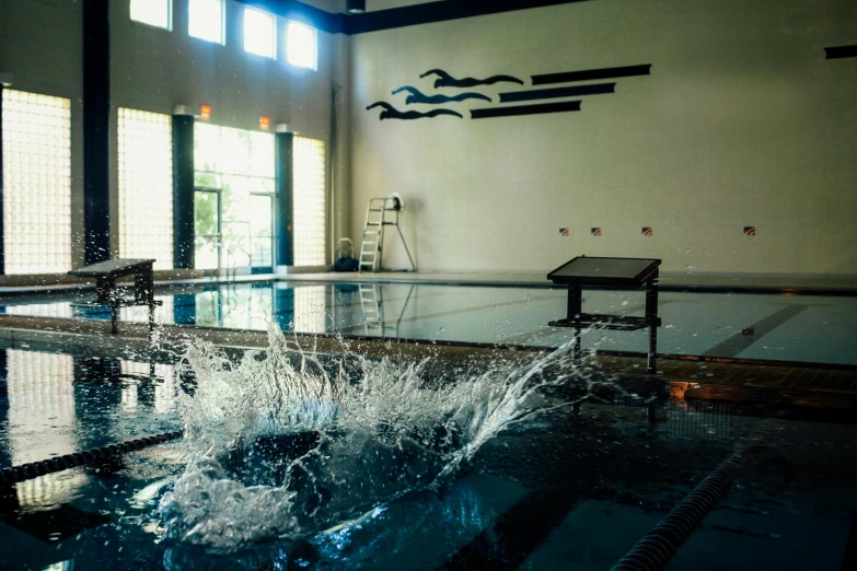 a water balloon in a pool with other water