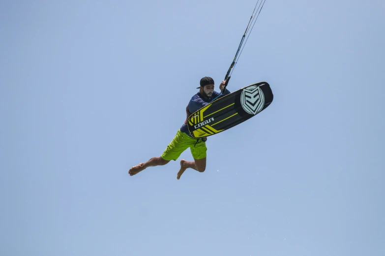 a person on the water on his surfboard