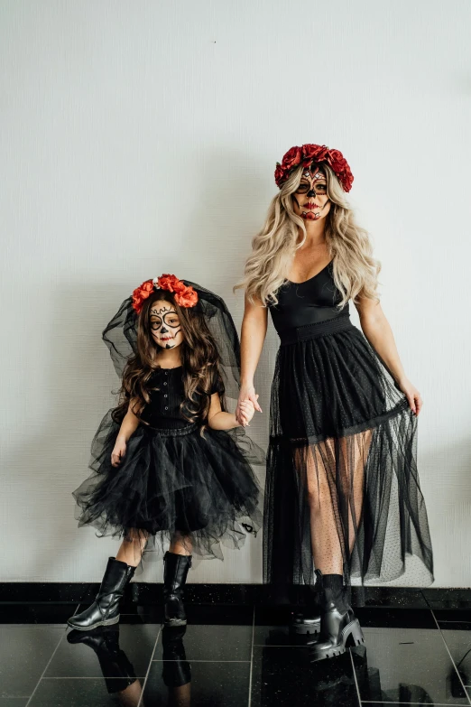 mother and daughter dressed up as the dead brides for halloween