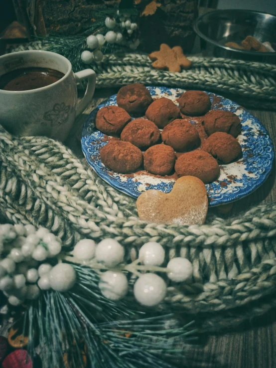 the cookies are on the blue and white plate