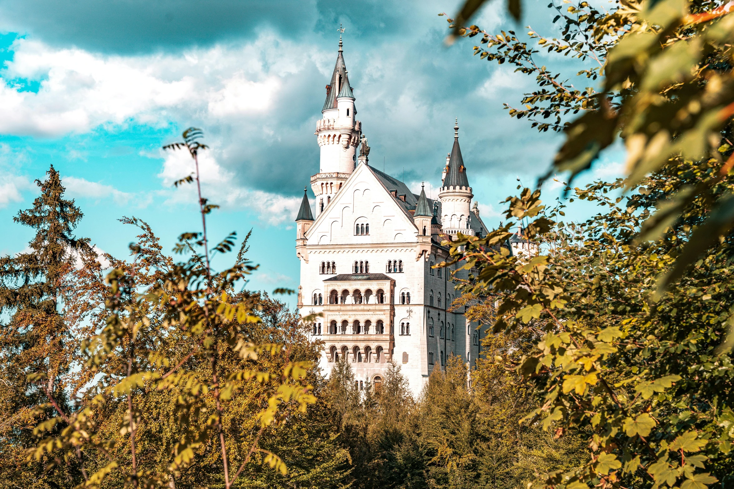 a very large castle with a tower and a clock