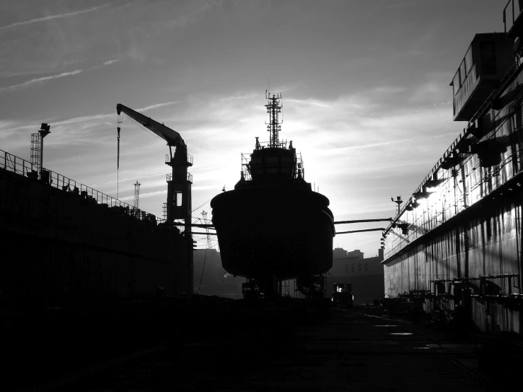 a ship going down the tracks in a port