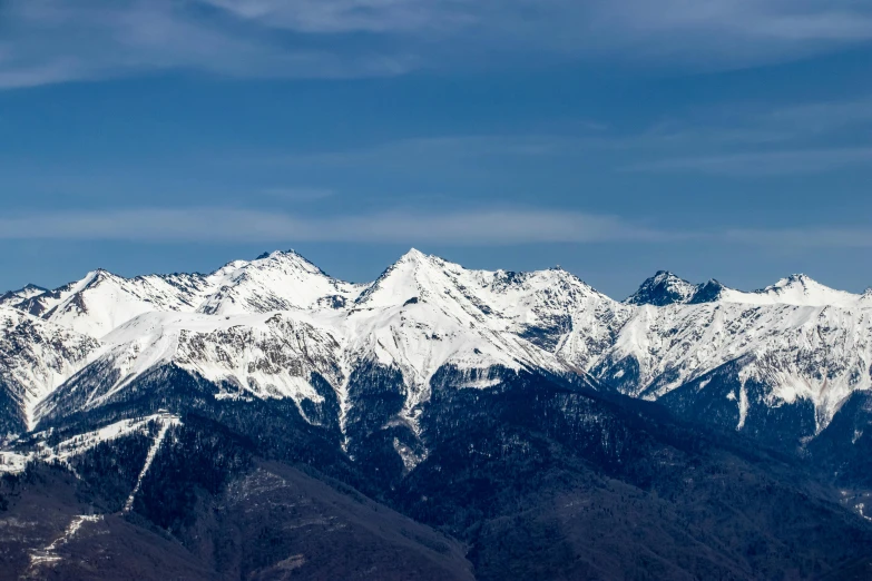 the top of a snowy mountain range