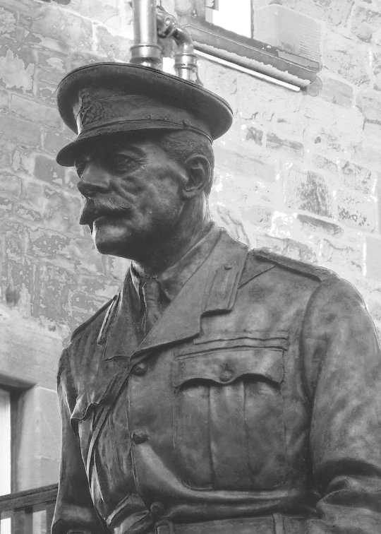 a black and white po of a statue of a soldier