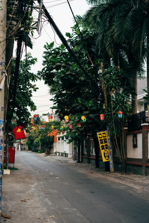 an empty, deserted street that is quiet and very narrow