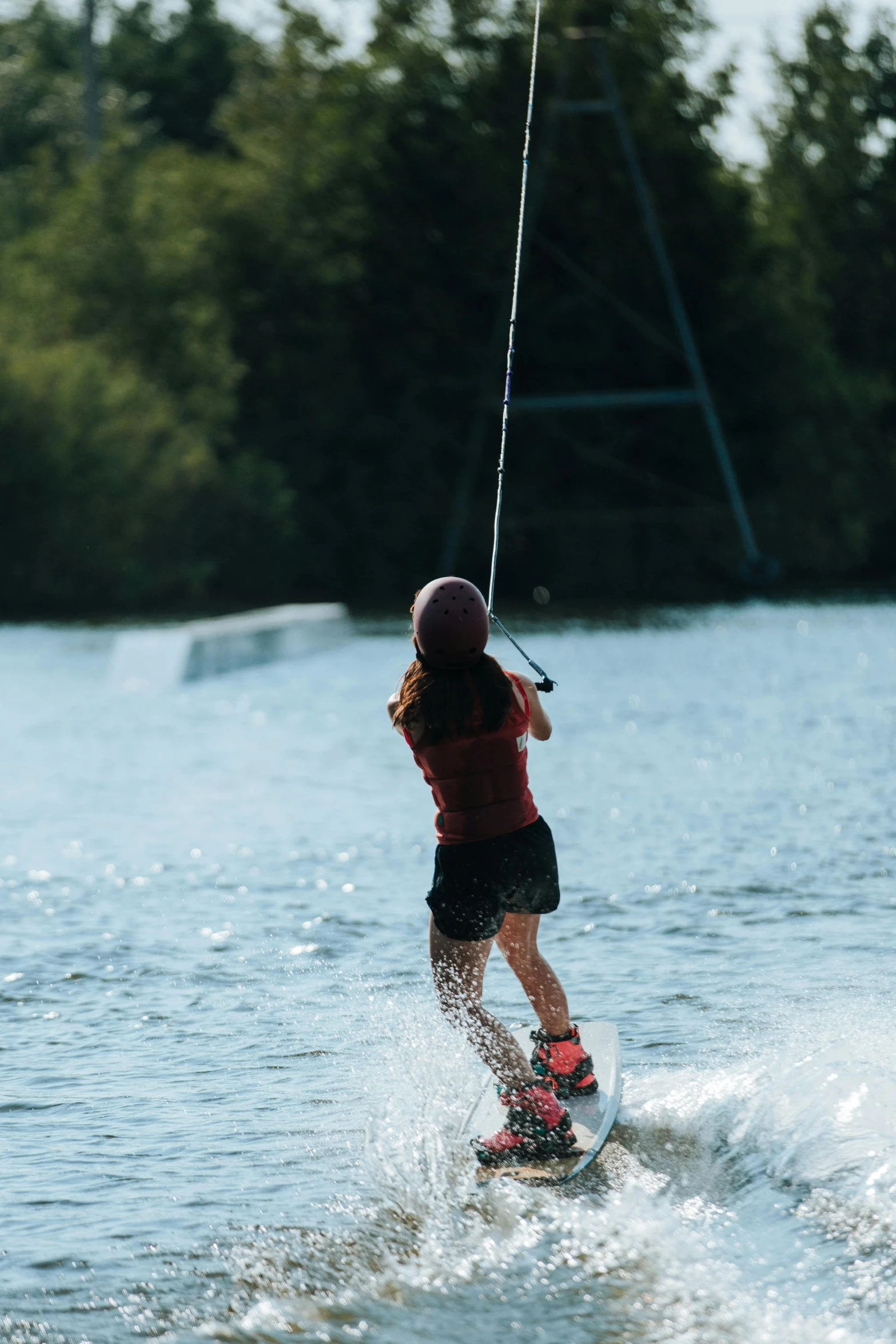 a person on skis being pulled across water