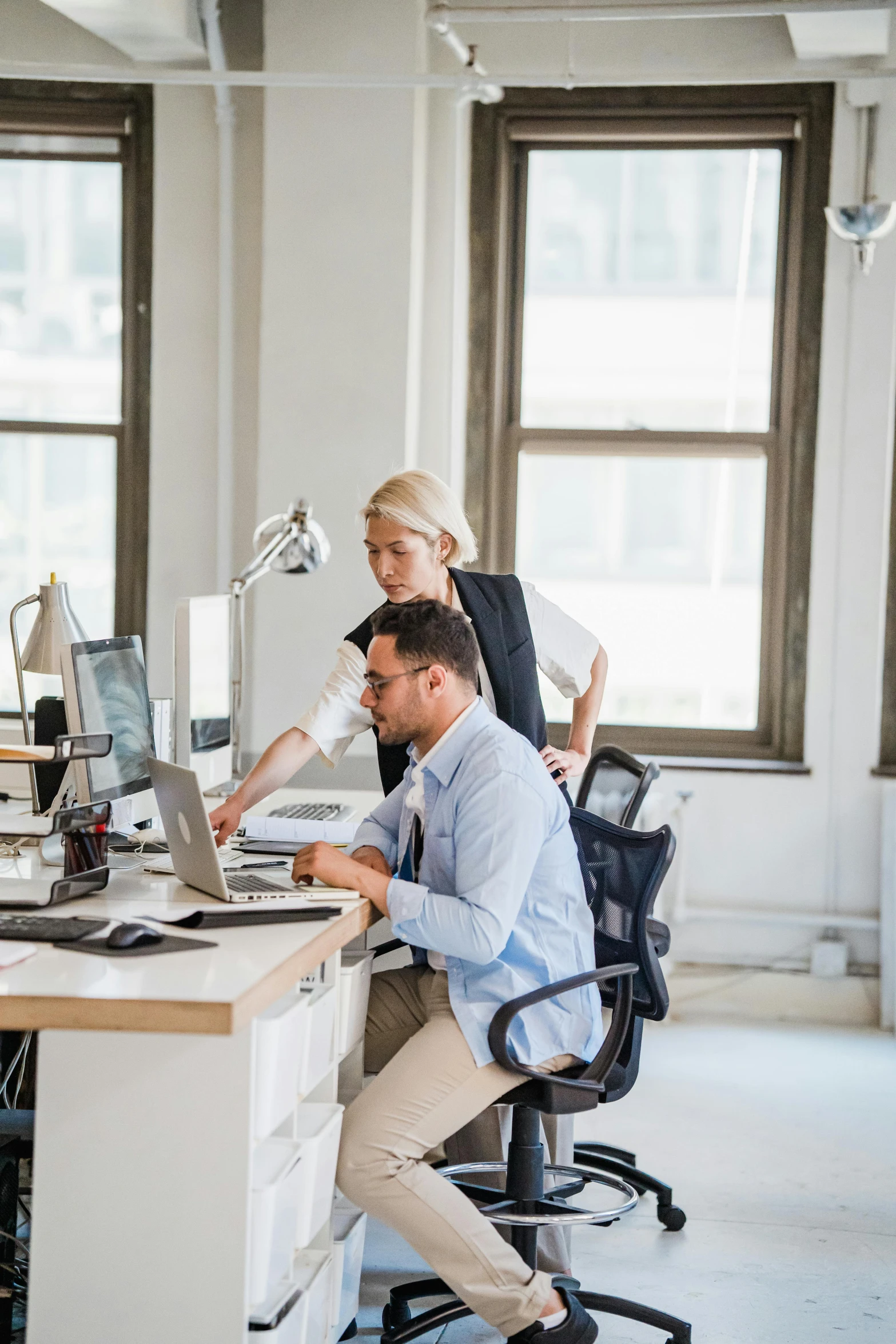 people working on their computers in an office