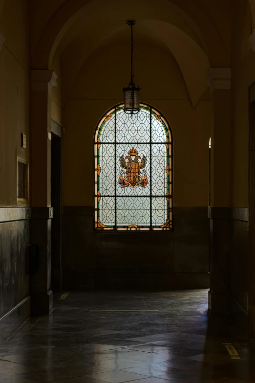 the stained glass window inside of a church