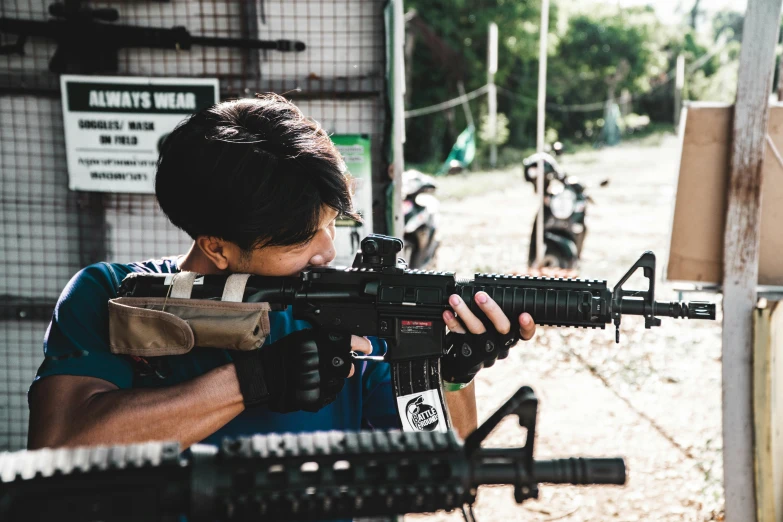 a person with a gun in their hand