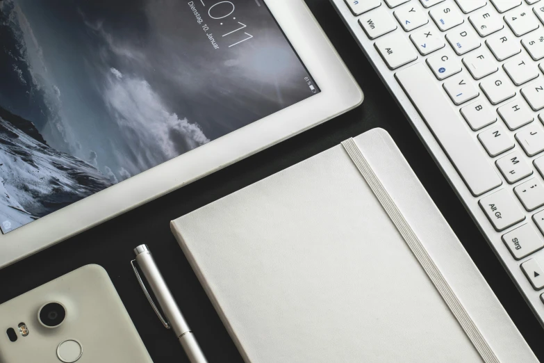 an image of a keyboard and tablet next to it