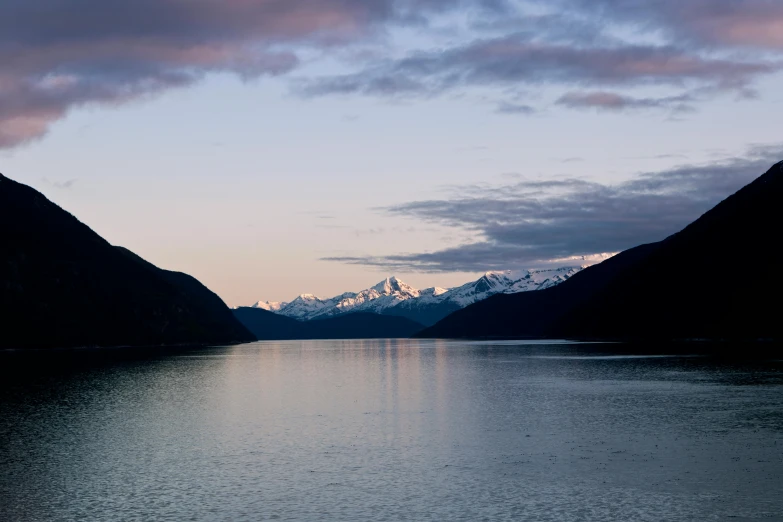 mountains, rivers and waters are in the distance at twilight